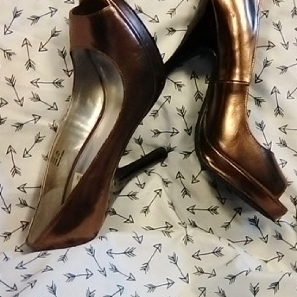 Heels.  Bronze Calvin Klein peeptoe heels.